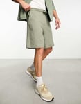 ASOS DESIGN Mens oversized shorts in khaki green waffle - Size Small