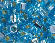 Perles japonaises cube argenté bleu 4 mm. 100 g.