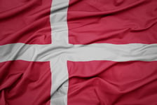 Waving colorful national flag of denmark