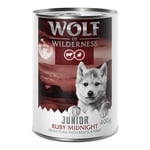 10 + 2 på köpet!  12 x 400 g Wolf of Wilderness - JUNIOR Ruby Midnight med fläskkött, nötkött, kanin