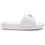 Claquettes enfant Lacoste  CLAQUETTES  SERVE SLIDE 1. ENFANT BLANCHES