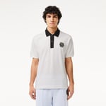 Polo Original L.12.12 avec badge Lacoste Taille S Blanc/noir