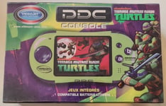 DDC Console Teenage Mutant Ninja Turtles. 4 jeux. Neuf sous blister d'origine.