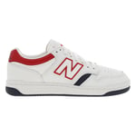 Baskets New Balance tennis en cuir blanches avec dessin brodé en rouge sur la languette