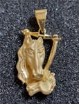 PENDENTIF TÊTE DE CHEVAL OR 18 CARATS. Poids 5,50 gr. Poignée 6 x 4 mm.