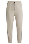 BOSS Mens Hadiko 1 Embossed-artwork tracksuit bottoms in stretch cotton