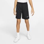 Don't let sweat slow you down with the Nike Dri-FIT Academy Shorts. Soft fabric Technology pulls from your skin, while mesh side stripes add breathability to help keep performing at a high pace all way through stoppage time. This product is made 100%-recycled polyester fabric. Older Kids' Football Shorts - Black
