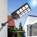 SWANEW Lampadaire solaire LED Projecteur étanche avec détecteur de mouvement et télécommande pour extérieur jardin terrasse 400W