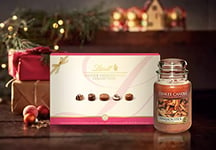 Yankee Candle Cinnamon Stick & Lindt Lindor Master Chocolatier Truffles Box Gift Set | Christmas Gift Set | Chocolate Box 470g, approx. 46 Chocolates | Scented Candle Burn Time: up to 150 Hours