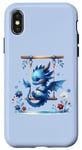 Coque pour iPhone X/XS Dragon ludique se balançant dans le jardin sur fond bleu.