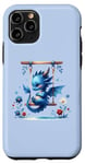 Coque pour iPhone 11 Pro Dragon ludique se balançant dans le jardin sur fond bleu.