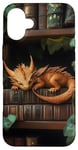 Coque pour iPhone 16 Plus Petit dragon endormi sur une bibliothèque