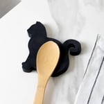 FISURA - Repose-cuillère original en forme de chat. Repose-cuillère support en silicone. Porte-cuillère pour plan de travail de Cuisine noir. 12x12 centimètres.