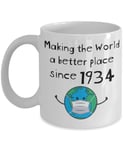Quarantine Birthday Mug - Making The World a Better Place Since 1934 - Mask Version - Funny 86th for 86 Year Old Woman Man Him Her - Stay at Home Coffee Cup -
