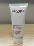 Clarins Moisture Rich Body Lotion with Shea 100ml Foil Sealed And Free Soft Bag