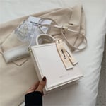 Beige laukku 17,5-6 cm-20 cm-uusi muoti naisten pieni laukku 2024 Trend PU -nahkainen olkalaukut naisille Söpöt lyhytkahvaiset Crossbody-laukut käsilaukut