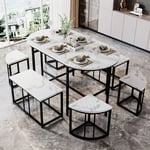 La table à manger, avec six chaises, des groupes de restauration, avec des coussins de siège mdf blancs et du fer en or, du luxe moderne et des