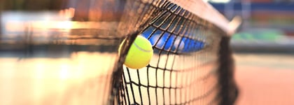 Tennis Ball Hitting The Net