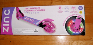 ZINC 'TWISTER' Folding scooter with battery free light up wheels.Brand New Boxed