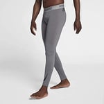 Nike M NP THRMA TGHT Pantalon de Sport Homme Gunsmoke/Atmosphere Grey/(Black) FR : S (Taille Fabricant : S-T)