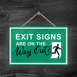 EXIT SIGNS ARE ON THE WAY OUT, STICK MAN GREEN EXIT SIGN ON A PLAQUE