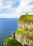 Cliffs of Moher and OBriens tower west coast of Ireland County Clare at wild atlantic ocean