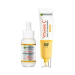 Garnier SkinActive - Coffret Routine Vitamine C - Sérum Anti-Taches Brunes + Fluide Anti-UV Quotidien Invisible - Réduit les Taches Brunes & Protection SPF50+ - Enrichis en Vitamine C - Tous Types de Peau