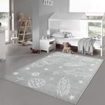 Tapis de jeu spatial gris avec vaisseaux spatiaux et planètes blancs