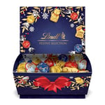 Lindt - Boîte festive - Assortiment de Chocolats au Lait, Noirs et Blancs - Idéal pour Noël, 690g