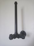 Black industrial kitchen roll holder wall mounted on black iron flange 