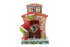 The Grinch by Jim Shore Grinch Pushing Tree Up Fireplace Figurine