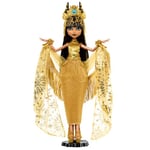 Monster High Fêtes de Fin d’Année Cleo De Nile Édition Hiver à collectionner en Robe dorée avec des accessoires étincelants et un châle chatoyant à franges, HXJ00