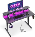 Bureau Gaming avec Lumières LED, Bureau Gamer avec Prises de Courant, Table Gaming avec Porte-Gobelet et Crochet pour Casque, Fibre de Carbone Noire, 100cm