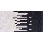 Beliani - Tapis Rectangulaire 80 x 150 cm en Peau de Vache Noir et Crème Moderne Pixel Bolu