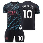 2324 Manchester City 2 borta barnfotbollströja med strumpor och skyddsutrustning 10 GREALISH children' sizes16