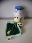 Doudou peluche Donald Duck Disney mouchoir vert feuille Tommy Toys 