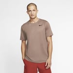 The Nike Pro Top feels lightweight and stretchy to keep you moving comfortably from your warm-up through cool-down. Fabric (made at least 50% recycled polyester) wicks sweat dry. Men's Short-Sleeve - Brown