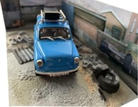 James Bond 007 ZAZ-965A from Goldeneye, 1:43 scale model with themed background