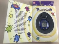 New Bandai Original TamaGotchi Blue & Black, Character 1996 - 1997 English