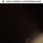 Eddy current suppression ring