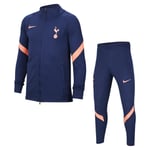 The Tottenham Hotspur Strike Tracksuit is made from sweat-wicking fabric with a little stretch to help keep you dry and comfortable. Zips on the lower legs make it easy change over boots or shoes. Older Kids' Football - Blue