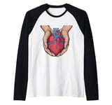 Anatomical heart in hands design Raglan Baseball Tee