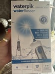 BRAND NEW SEALED Waterpik Cordless Plus Dental Water Flosser WP450 UK A