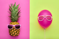 Pineapple and Pink air Balloon Bright Summer Color Accessories Tropical Hipster pineapple with Sunglasses Creative Art concept Minimal style Summer party background Fun