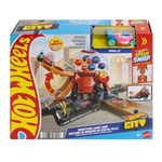 Hot Wheels Toy Car Track Set, Gumball Machine Playset with 1:64 Scale Die-Cast Donut-Shaped Vehicle & Speed Snap Track, Downtown City Candy Shop