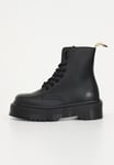 DR.MARTENS Bottes Et Anfibi Femme Noir Anfibi Plateforme Jadon II Mono Vega