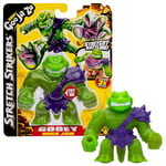 Heroes of Goo Jit Zu BANDAI CO42845 Figurine d'action découvrez Les Strikers Rock Jaw, éponge et étire, Multicolore,