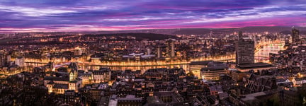 Cityscape from Mountain de Bueren in Liege Belgium at dusk The river Maas leads through the scenery