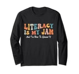 Groovy Literacy Is My Jam And I'm Here To Spread It Teacher Long Sleeve T-Shirt