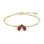 Swarovski Bracelet-jonc Idyllia décoré par un motif coccinelle et un pavage de cristaux rouges et noirs, en placage de ton or